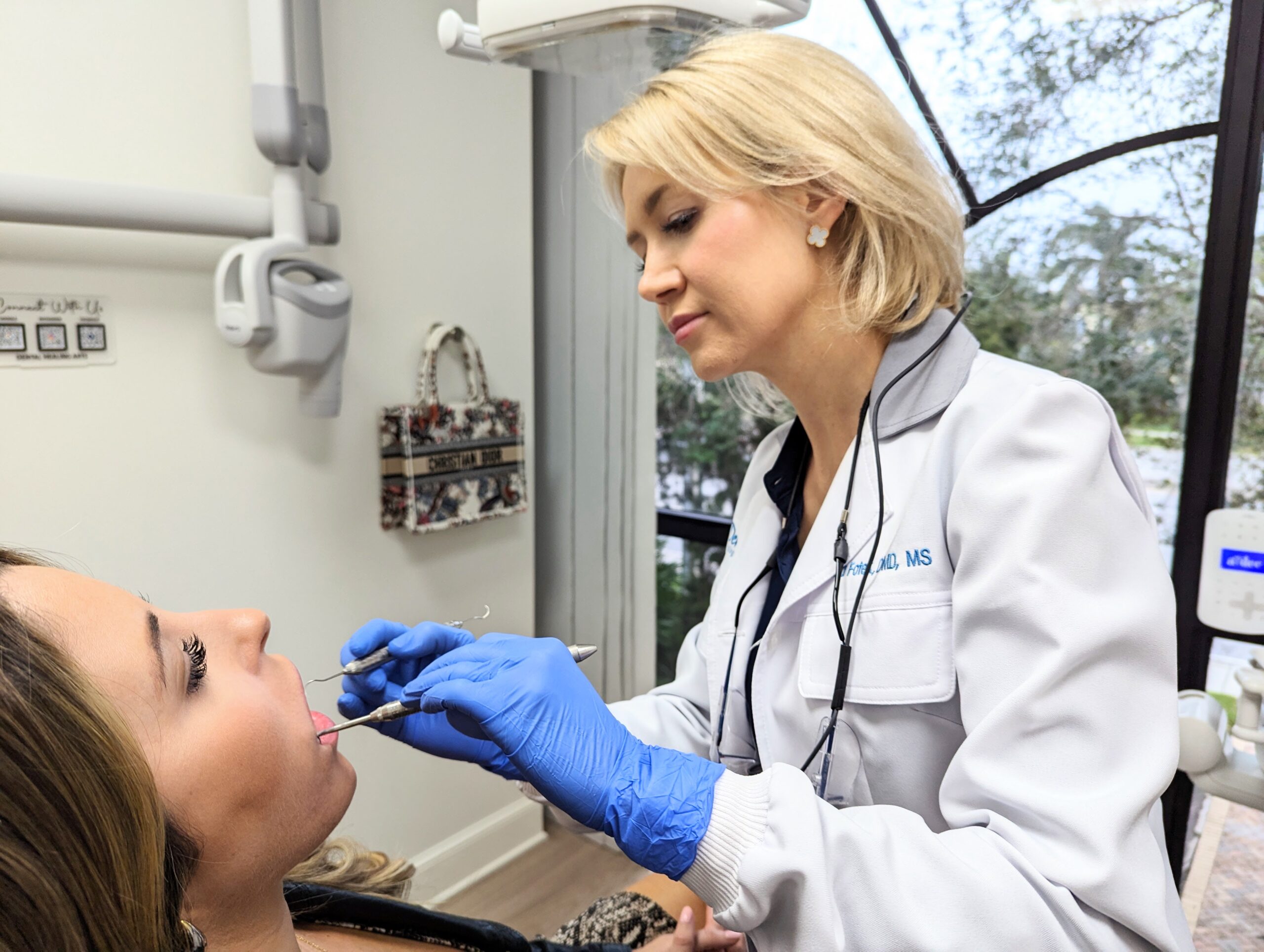 Holistic Periodontist Performing Gum Treatment